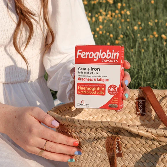 Feroglobin Capsules in the Hands of a Woman